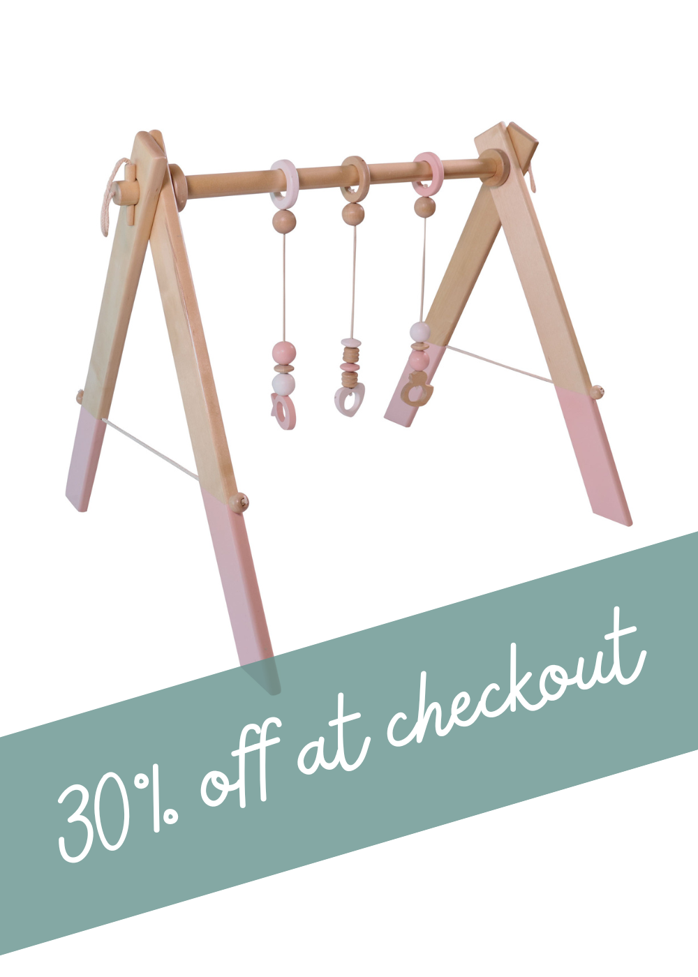 Wooden baby gym in pastel pink with 30% off at checkout