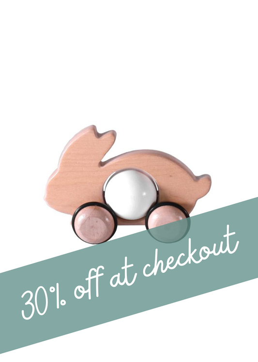 Wooden Push Toy | White Bunny with smooth wheels and 30% off at checkout promotion.