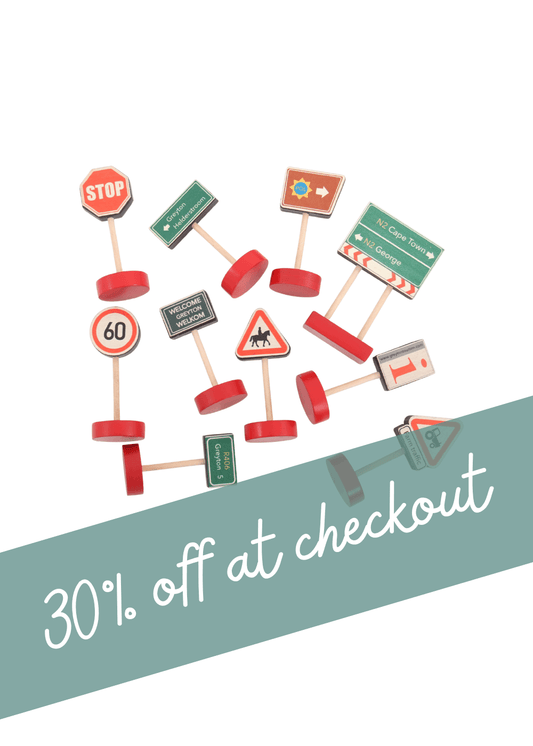 Wooden road sign toy set featuring various mini traffic signs and a promotional text for 30% off at checkout.