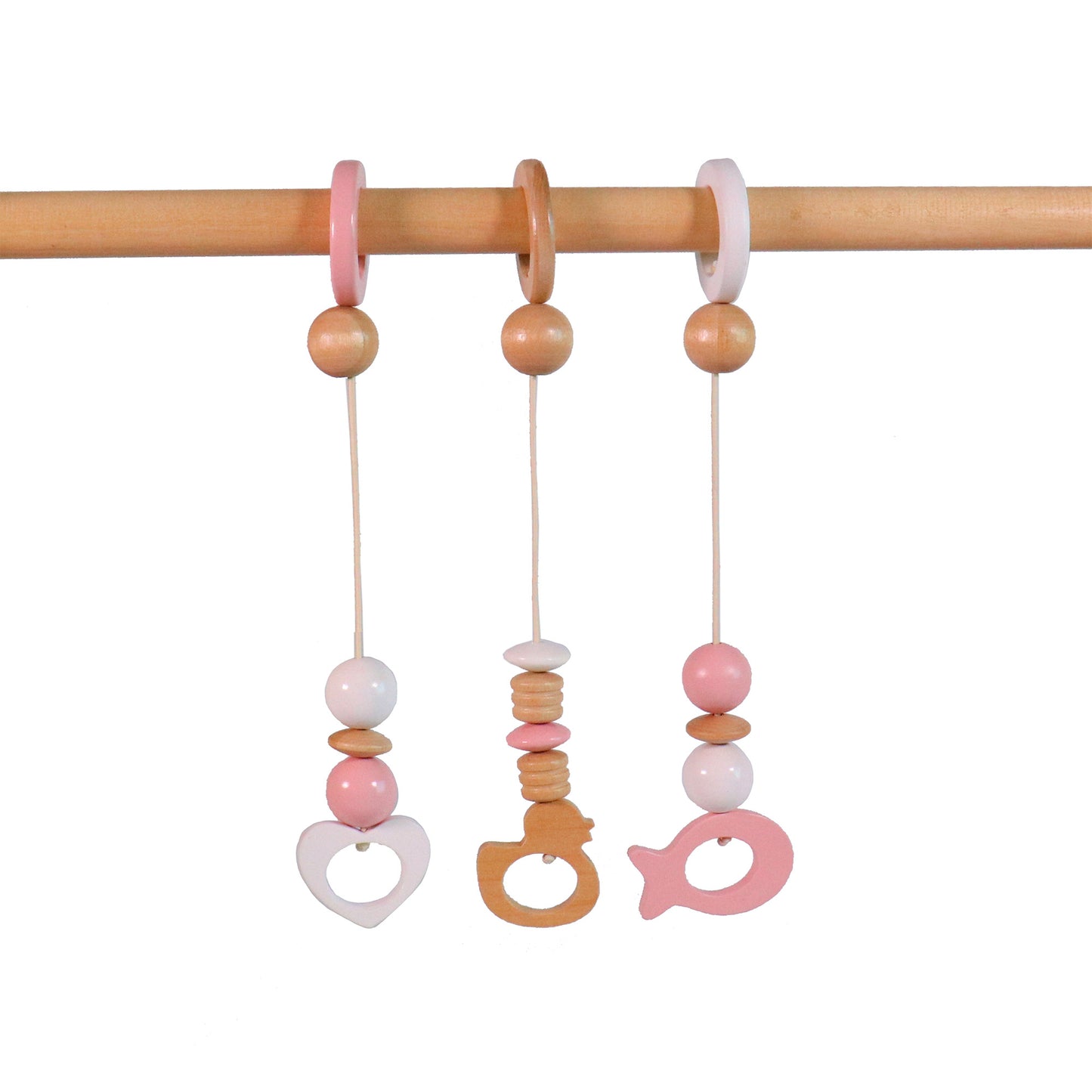 Wooden baby gym accessories featuring pastel pink and natural wood hanging toys.