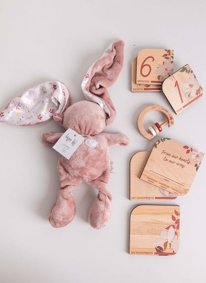 Baby gift set featuring Tiger Lily Bunny, milestone disks, and a rattle for celebrating early moments.